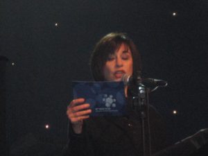 Nurit Hirsh reading the reasons for handing the ACUM Lifetime Achievement Award to Dudu Barak, 2008.